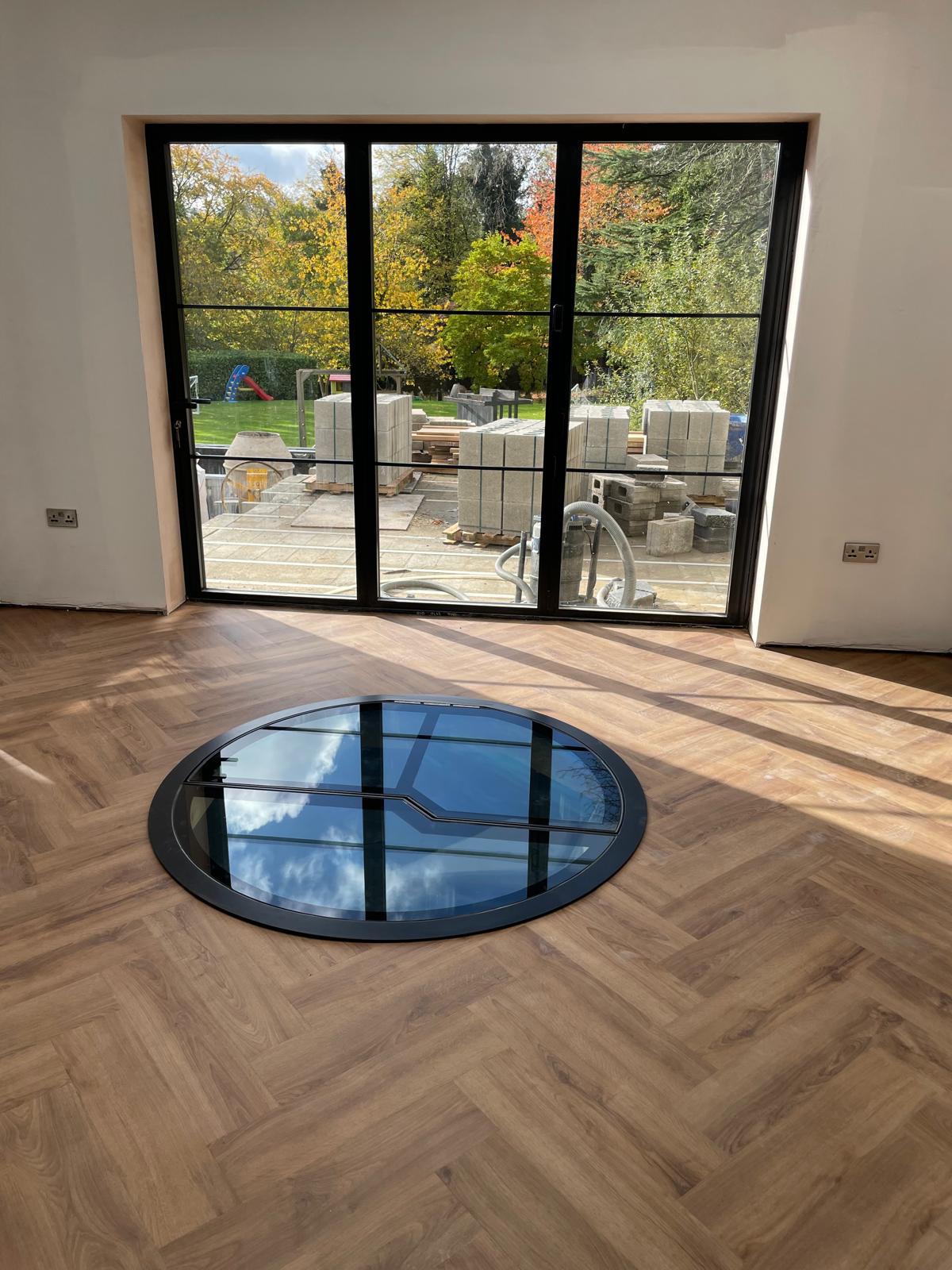 wine cellar glass floor hatch spiral cella